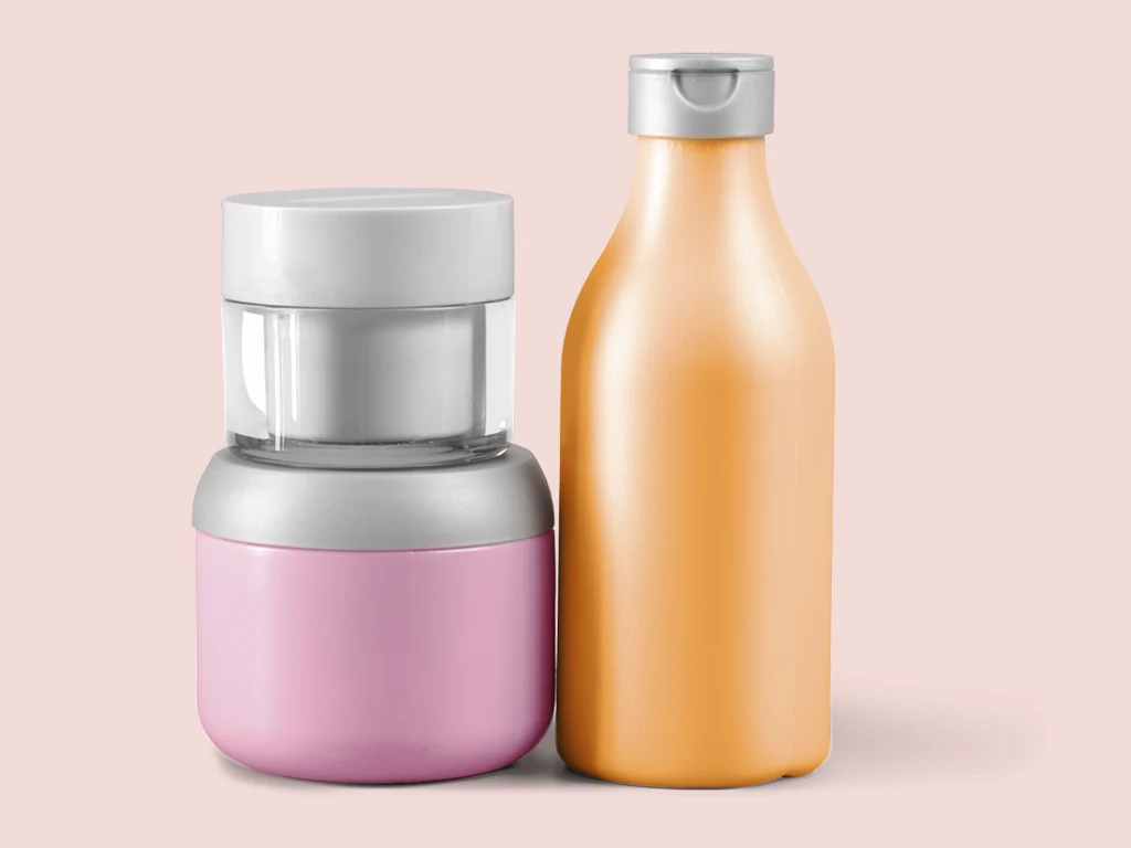 Bulk photo editing services for e-commerce, exemplified by clean product shots of bottles.